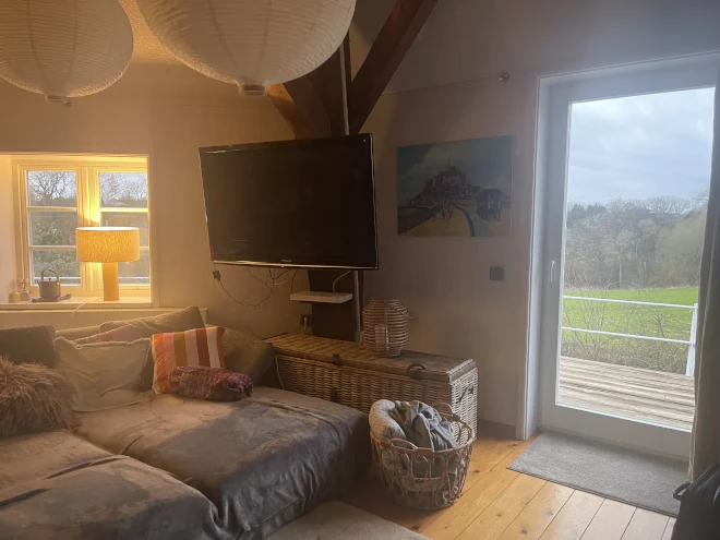 Sofaecke mit Außentür zum Mühlenrundgang. Sofaecke mit Außentür zum Mühlenrundgang - Wohnbereich im 1. OG Bild 7 660/495